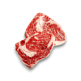 Two pieces of marbled black onyx rib fillet