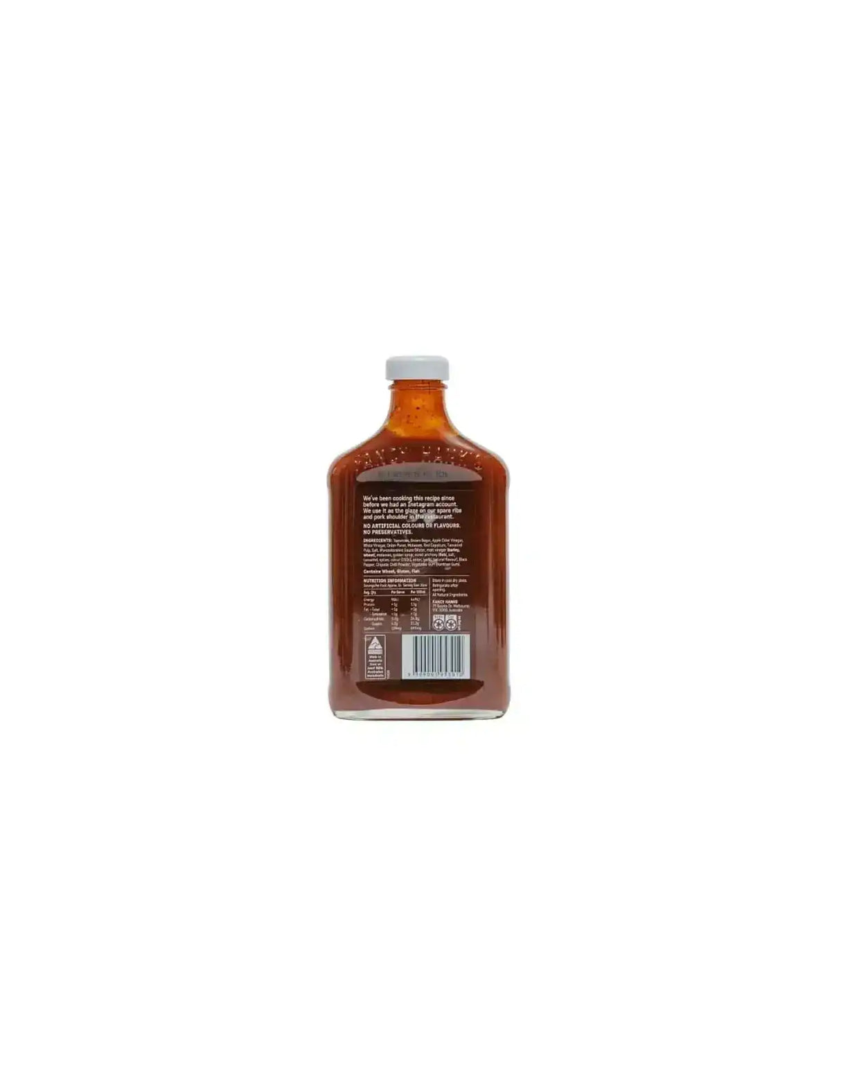 Back of a glass bottle of BBQ sauce with ingredient and nutrition facts label.
