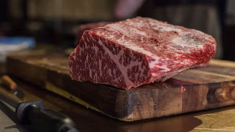 Premium marbled Wagyu beef cut on wooden board from Peter Augustus Craft Butcher