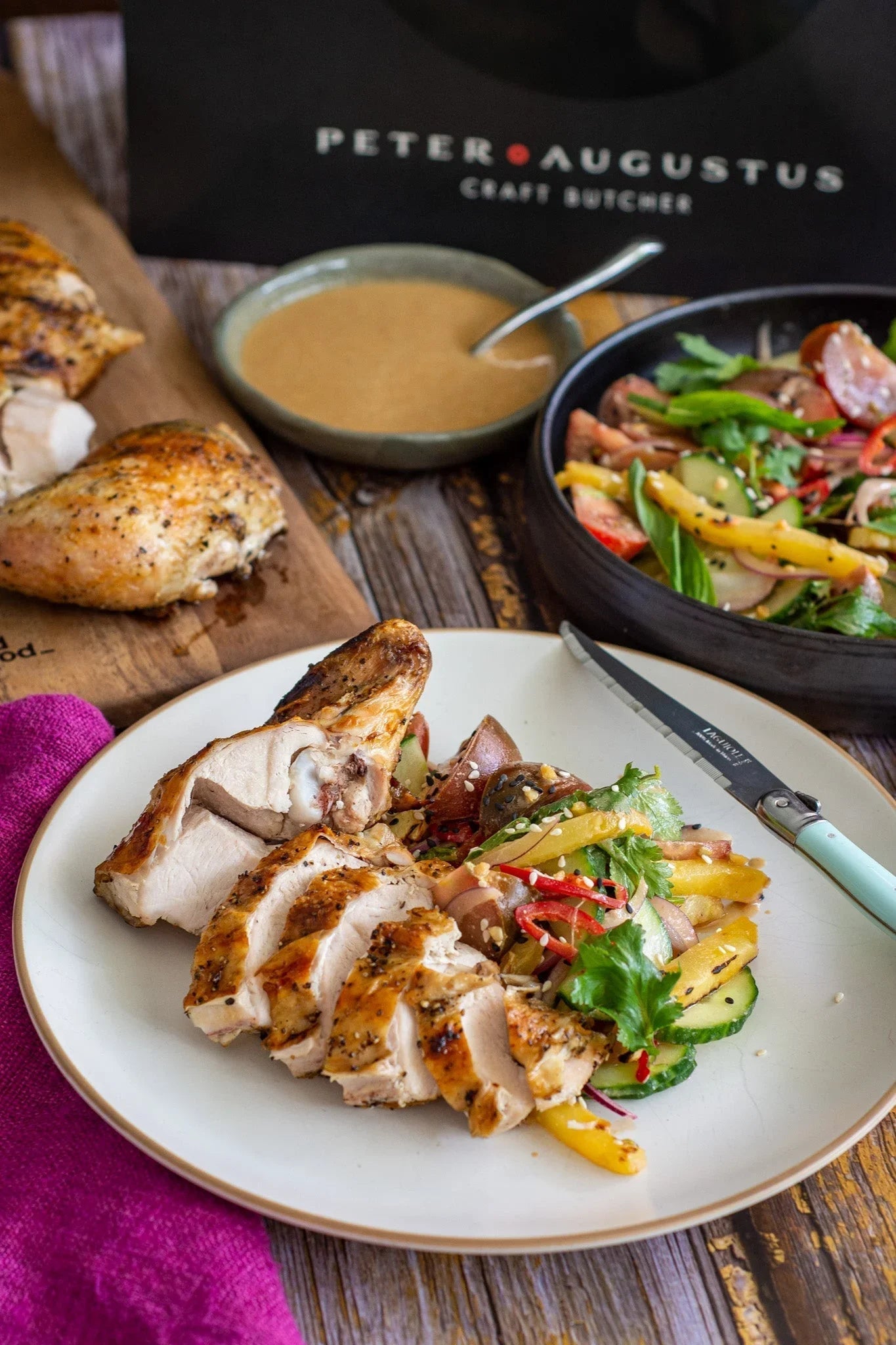 Sliced roasted chicken breast with fresh salad and gravy by Peter Augustus Craft Butcher