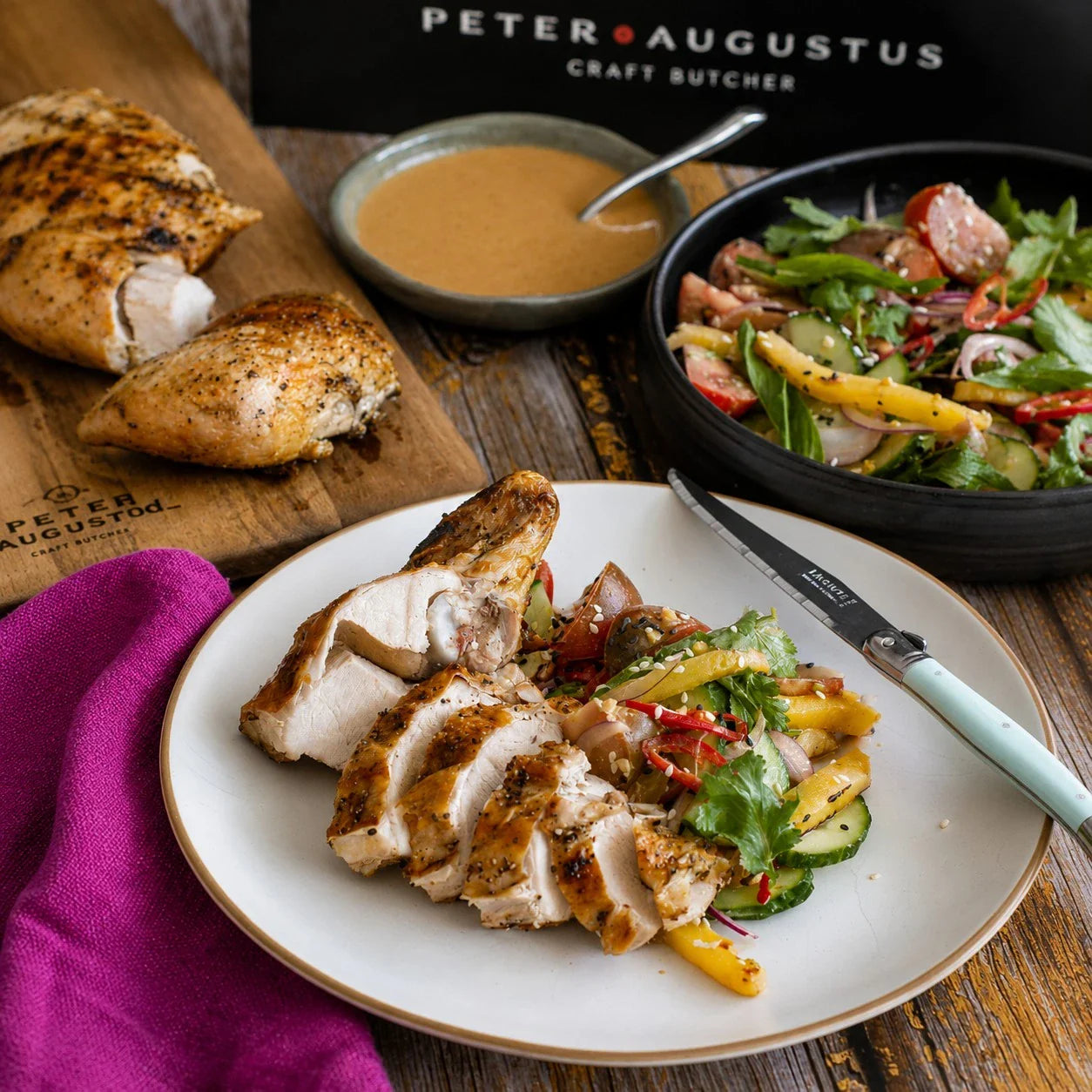 Sliced roasted chicken breast with fresh salad and gravy by Peter Augustus Craft Butcher