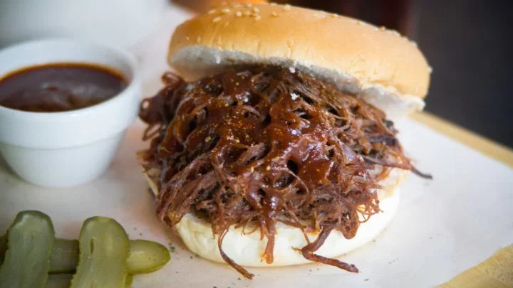 Shredded Australian beef sandwich with barbecue sauce and pickles from Peter Augustus Craft Butcher
