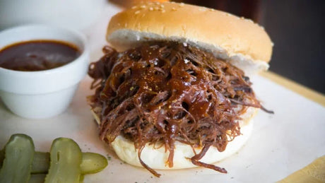 Shredded Australian beef sandwich with barbecue sauce and pickles from Peter Augustus Craft Butcher