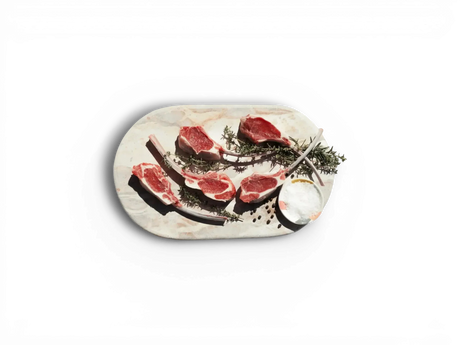 Australian lamb chops on marble board with rosemary and salt from Peter Augustus Craft Butcher