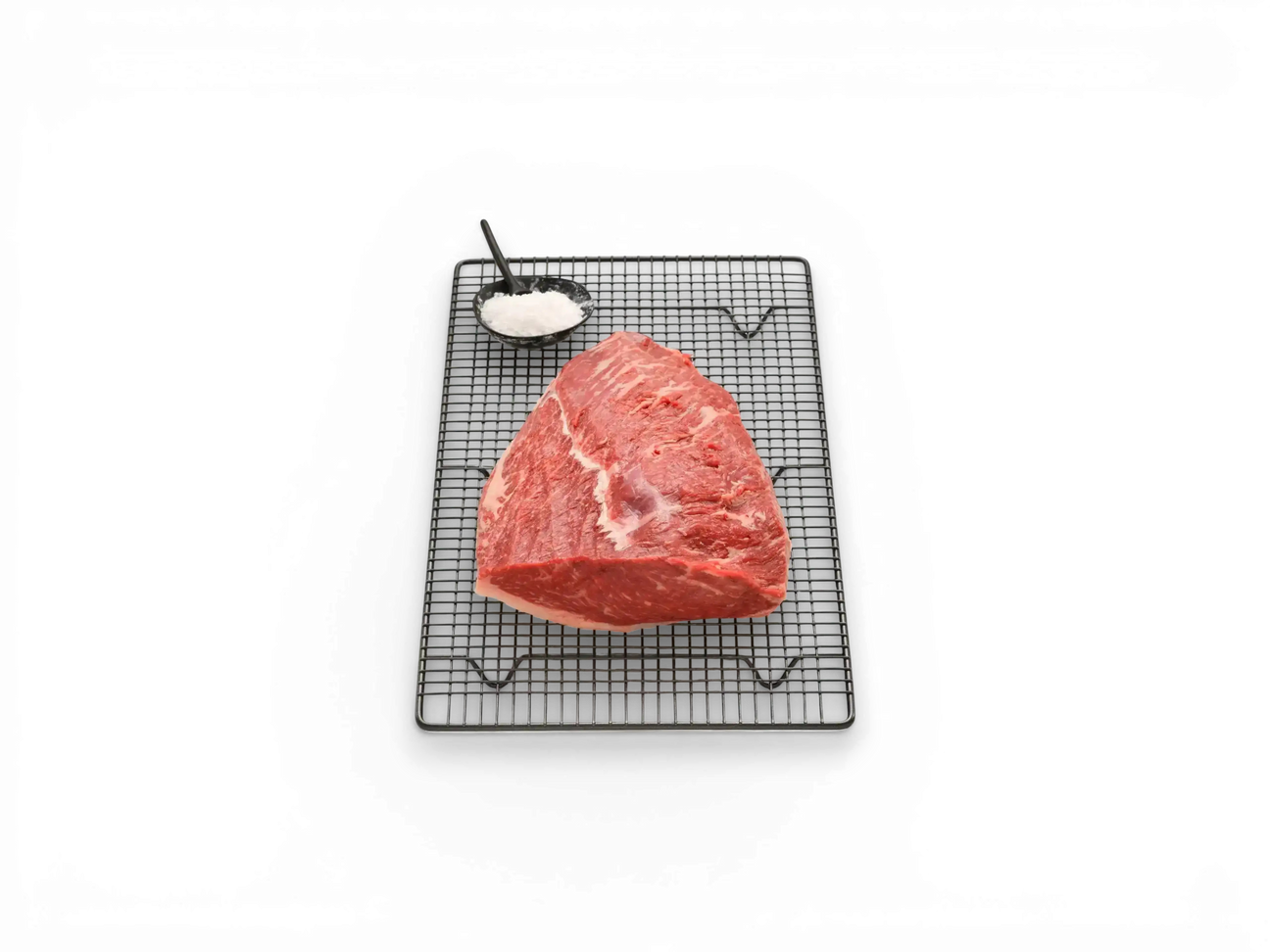 Peter Augustus premium Wagyu rib fillet piece on parchment and wooden platter