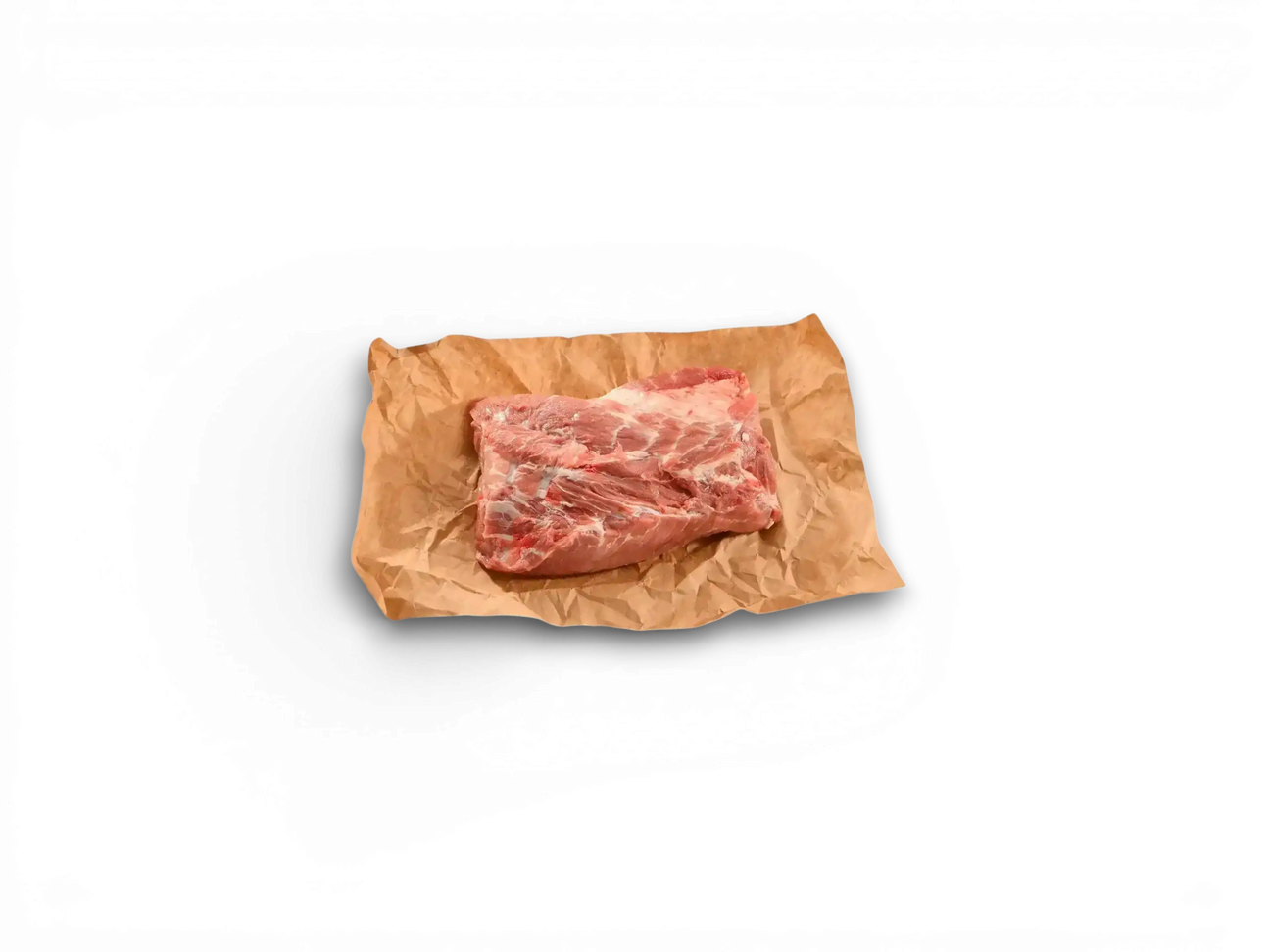 Premium pork belly slab on parchment paper with salt and pepper, Peter Augustus Craft Butcher