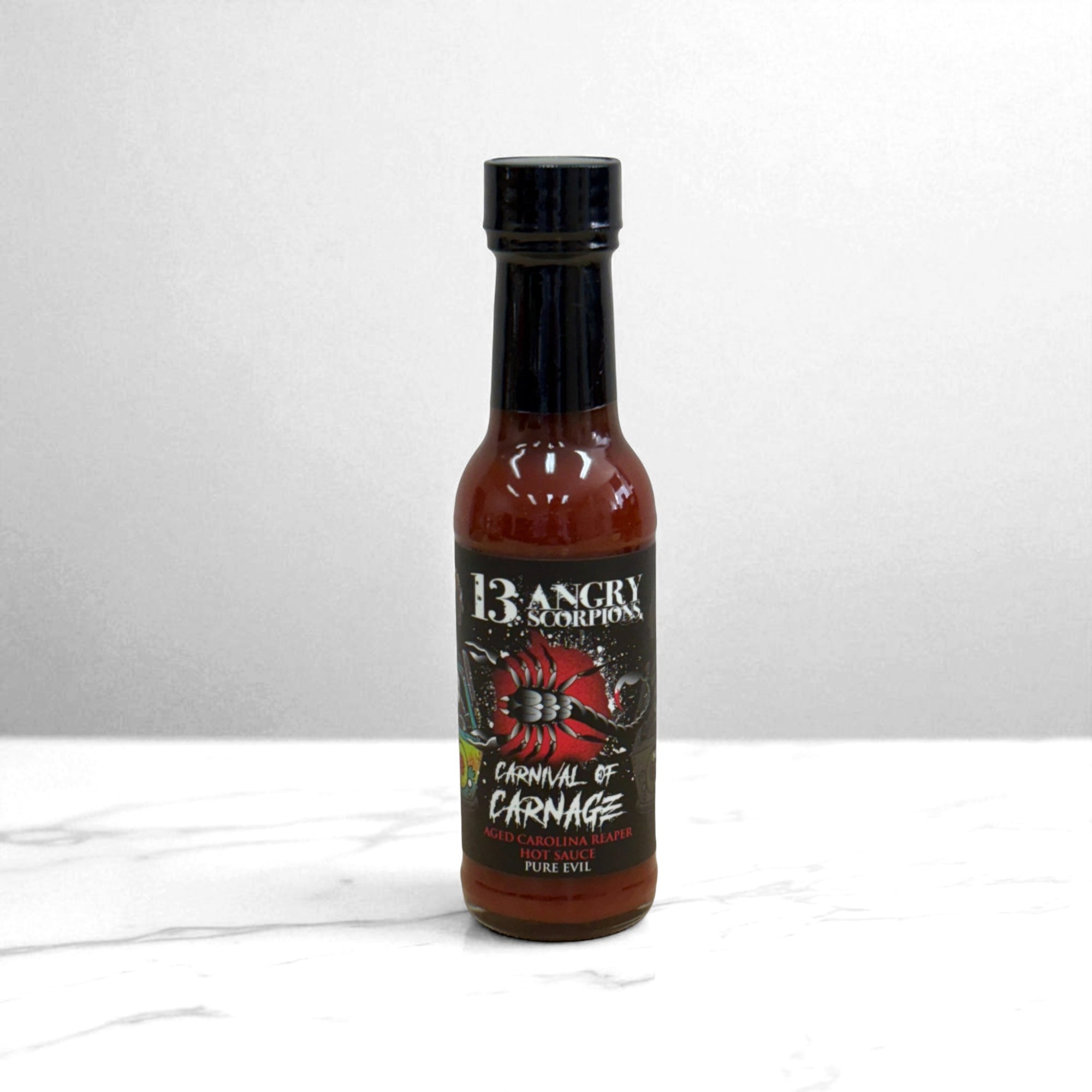 Carnival of Courage Hot Sauce – Carolina Reaper, Citrus & Blueberry blend