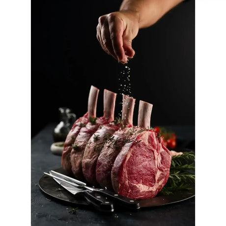 Hand seasoning premium Australian beef rib roast with salt, Peter Augustus Craft Butcher