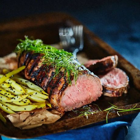 Grilled Australian beef tenderloin topped with fresh herbs, served with yellow beans, premium cut