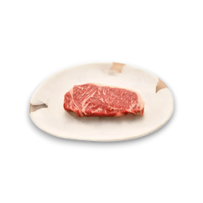 Marbled Black Onyx Sirloin steak on white plate, fresh premium cut for grilling or searing