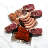 Peter Augustus Carnivore’s Choice meat box featuring gourmet sausages, Diamantina Wagyu steaks, and patties