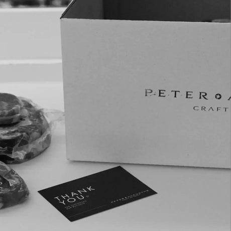 Peter Augustus Craft Butcher box beside vacuum-sealed premium beef steaks and thank you card