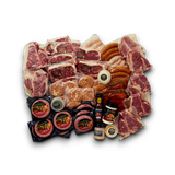 Premium beef assortment with Wagyu steaks, Angus cuts, sausages, patties, and seasonings, vacuum-sealed for freshness