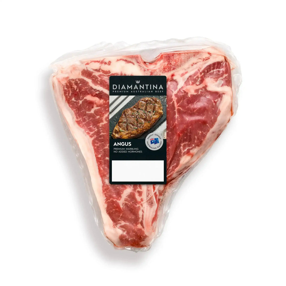 Vacuum-sealed Diamantina Angus T-bone steak with visible marbling on white background