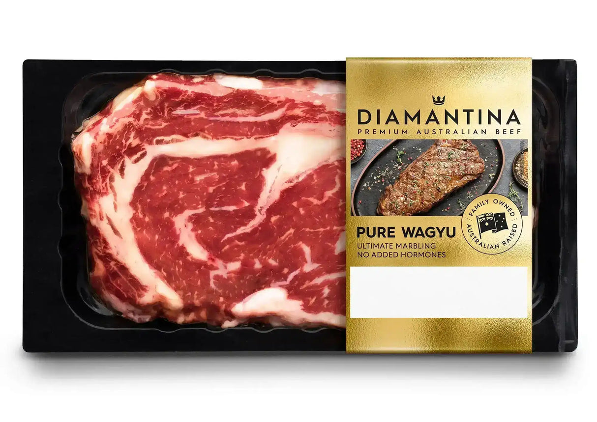 Packaged Diamantina Pure Wagyu rib fillet steak with visible marbling in black tray