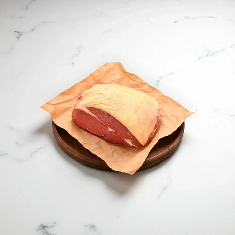 Diamantina grass fed rump roast on butcher paper, premium Australian beef from Peter Augustus