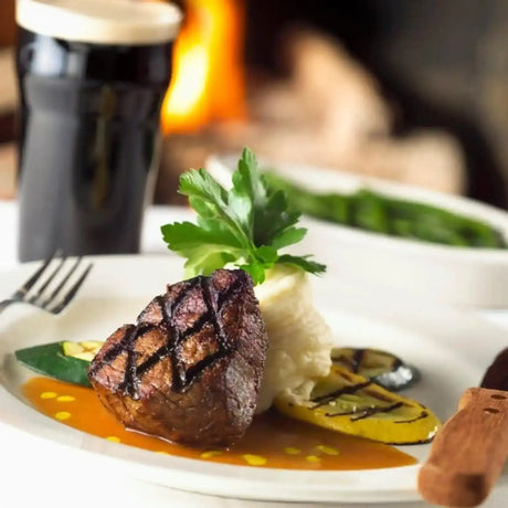 Grilled Australian beef steak with mashed potatoes and vegetables, served at Peter Augustus Craft Butcher