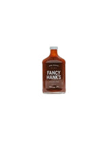 Bottle of Fancy Hank's Original BBQ Sauce, Australian made, isolated on white background