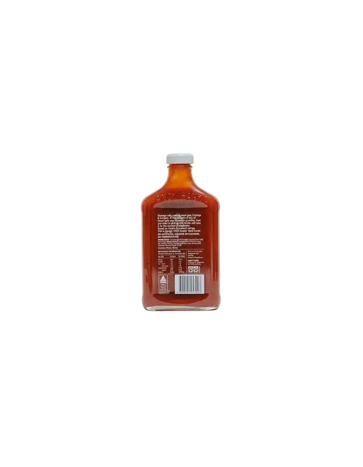 Back of a glass bottle filled with tomato sauce, showing product label and nutrition facts.