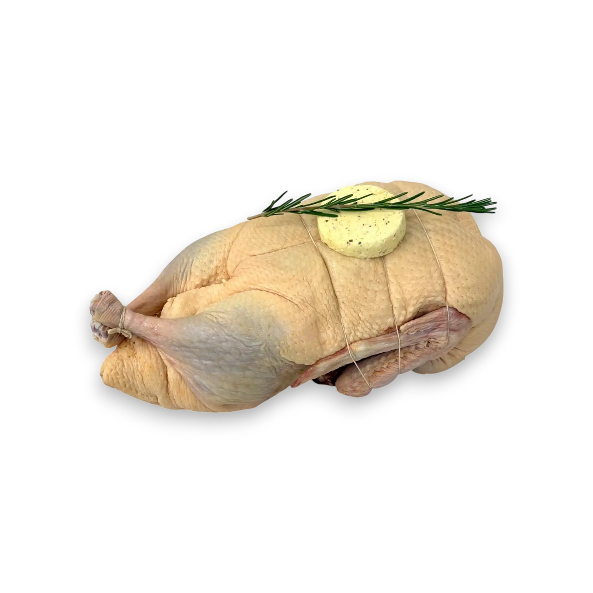 Raw chicken with butter and rosemary on a white background