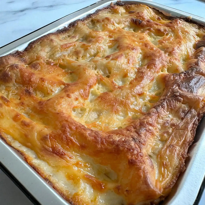 Golden baked lasagna with melted cheese from Peter Augustus Craft Butcher selection