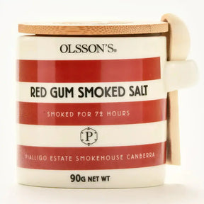 Ceramic jar of red gum smoked salt 90g with bamboo lid and striped label.
