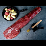 Raw Wagyu eye fillet steak from Peter Augustus Craft Butcher with diced potatoes and brush.