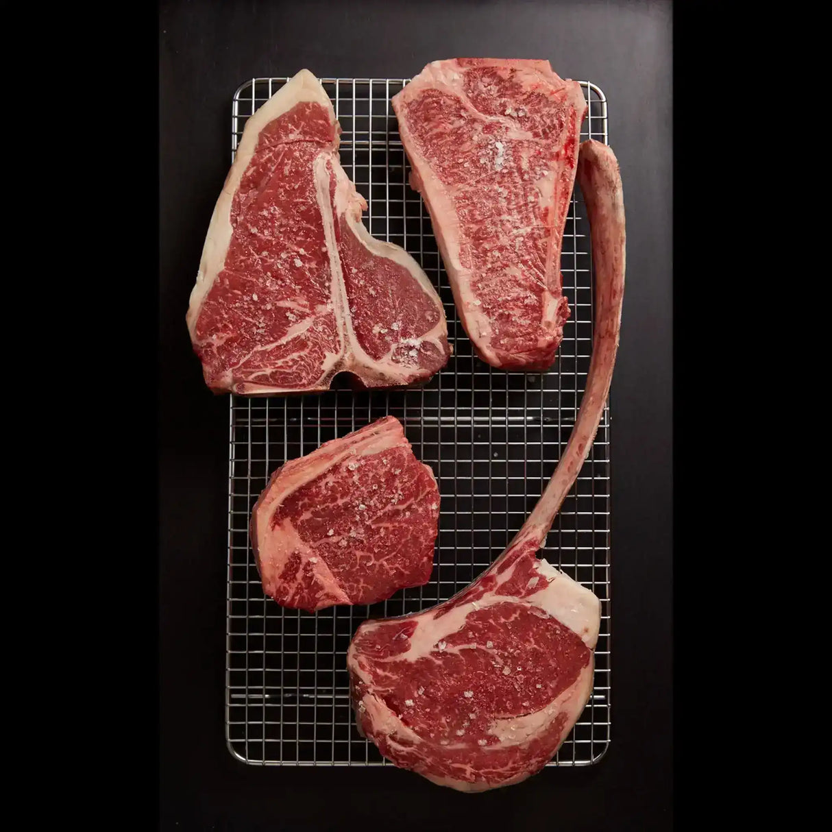 Premium Australian beef steaks including tomahawk, porterhouse, and T-bone from Peter Augustus