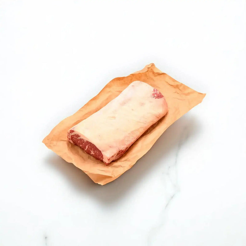 Peter Augustus Angus sirloin whole cut, raw beef on brown butcher paper