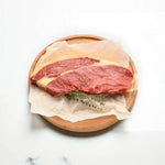 Peter Augustus rump steak on parchment with fresh herbs, premium Australian beef