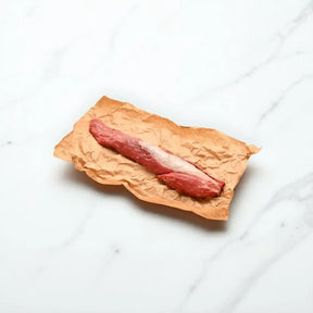 Whole raw Wagyu eye fillet on butcher paper from Peter Augustus Craft Butcher