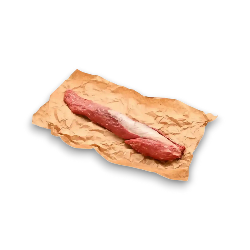 Fresh raw beef tenderloin on butcher paper, premium grass-fed beef cut for grilling or roasting