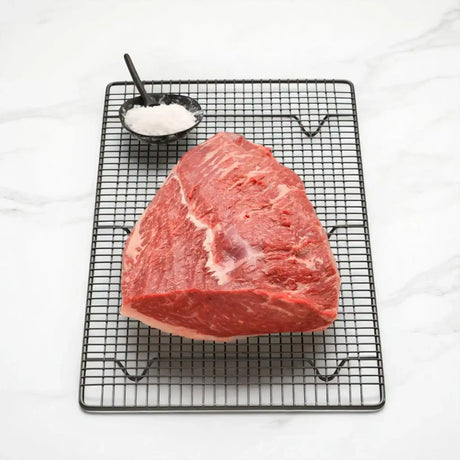 Australian Wagyu rump cap steak on wire rack with dish of salt, Peter Augustus Craft Butcher