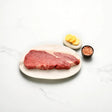 Australian Wagyu rump steak from Peter Augustus on a plate with sliced butter and salt