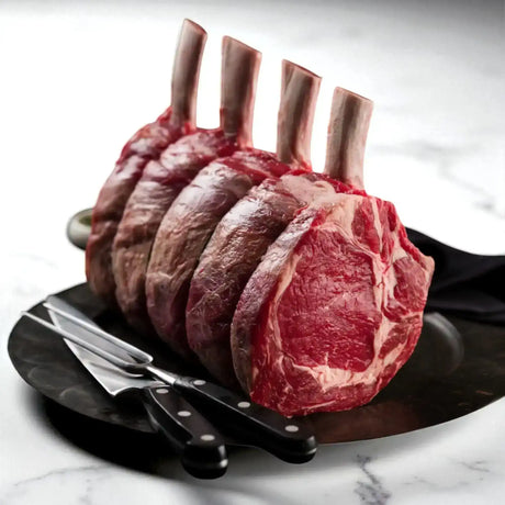 Premium bone-in rib roast beef from Peter Augustus Craft Butcher on serving platter