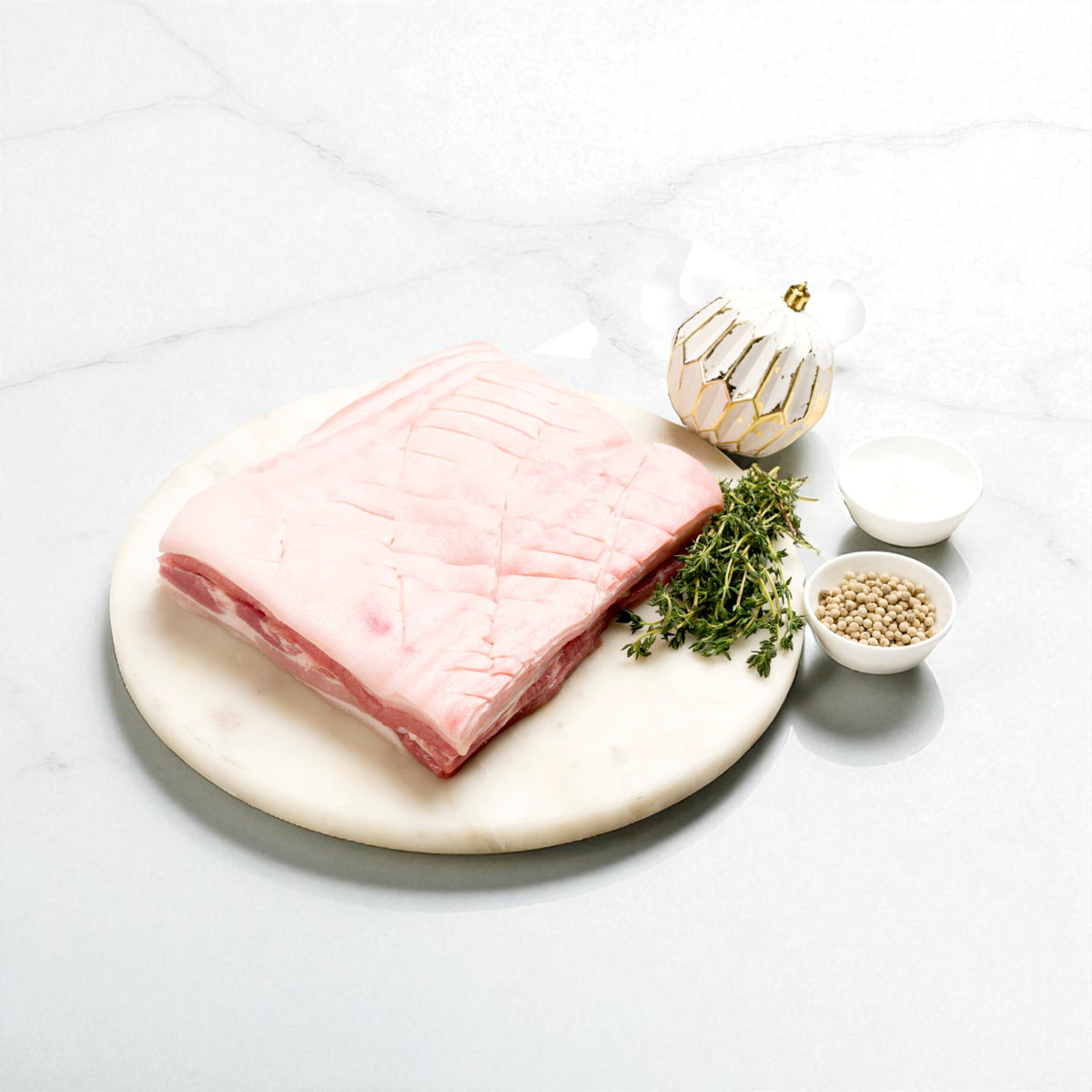 Boneless pork belly with skin on – 2kg, perfect for roasting with crispy crackling.
