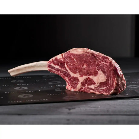Premium Australian tomahawk steak with rich marbling from Peter Augustus Craft Butcher