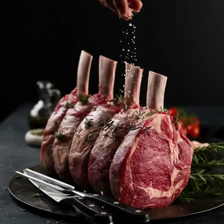 Hand seasoning premium Australian beef rib roast with salt, Peter Augustus Craft Butcher