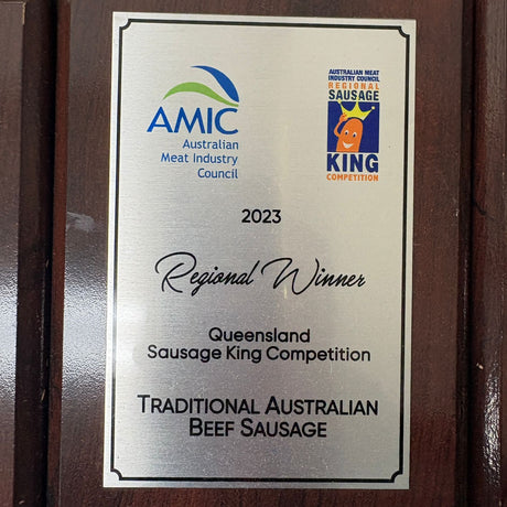 Wooden plaque with AMIC and Queensland Sausage King Competition win