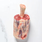 Raw bone-in beef roast tied with butcher twine, Peter Augustus Australian beef