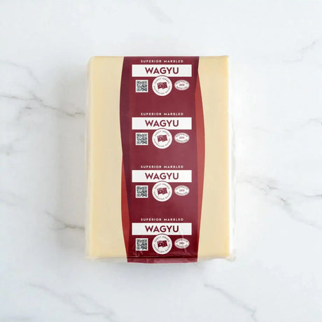 Block of Australian Wagyu beef tallow with labeled packaging from Peter Augustus Craft Butcher