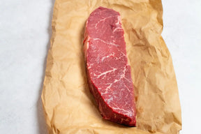 Australian Wagyu center cut rump steak with marbling on butcher paper