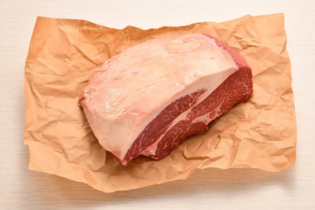 Whole Australian Wagyu rump steak with marbling on butcher paper