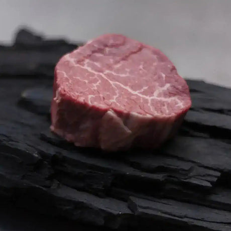 Premium Australian Wagyu steak with marbling on black wood, Peter Augustus Craft Butcher