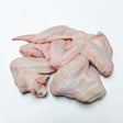 Raw chicken wings on white background, fresh poultry meat for cooking or grilling